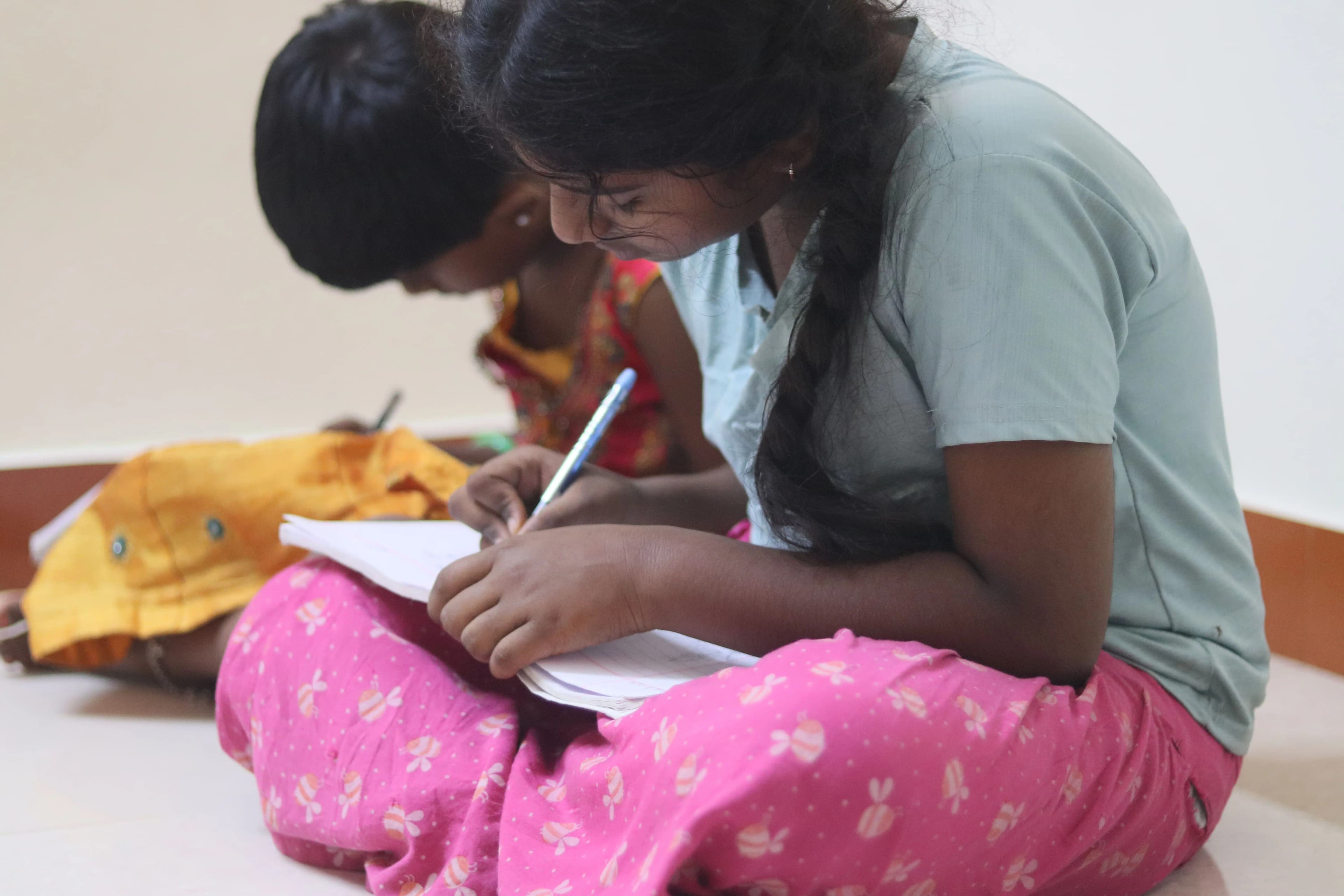 Girls receiving educational support